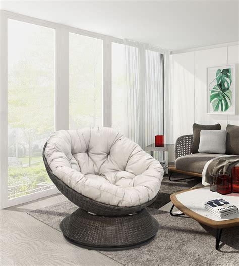 I suggest neutral pillows you can accessorize or easily re-cover down the road. . Oversized papasan chair